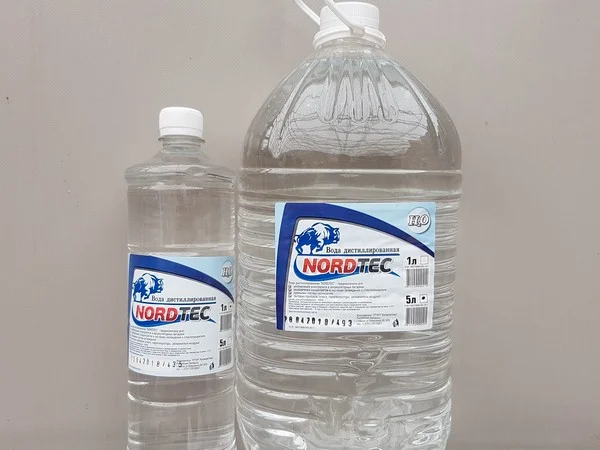 NWA5 NORDTEC Вода дистиллированная для промывки системы охлаждения, разбавления охлаждающих жидкостей, наполнения утюгов, увлажнителей, пароочистителей, 5 л (фото 2)