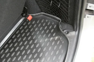 Коврик автомобильный резиновый в багажник LADA Largus, 2012-> ун. кор. 7 мест. (полиуретан) ELEMENT/NOVLINE NLC5226B12